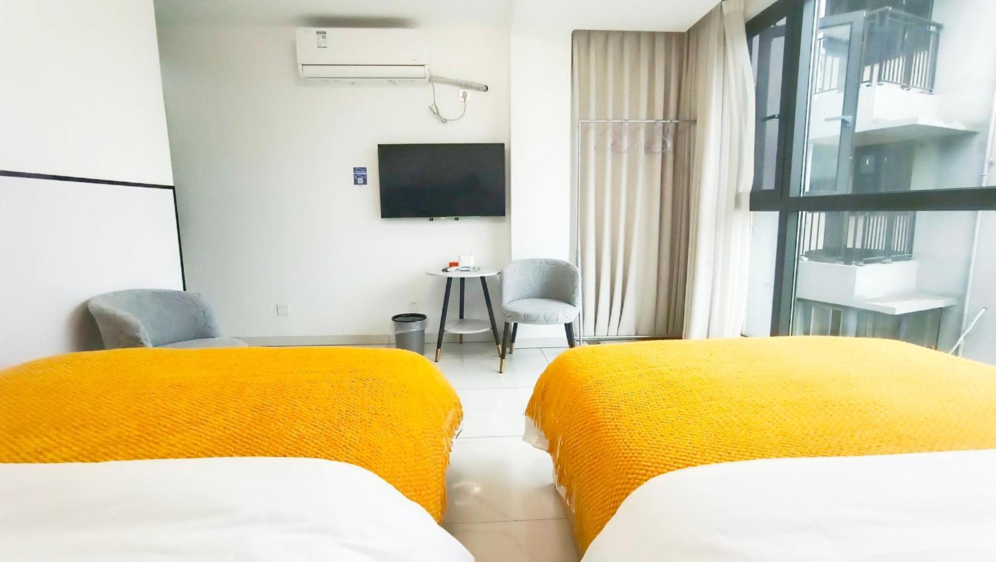 Qingfeng West Station Branch Homestay